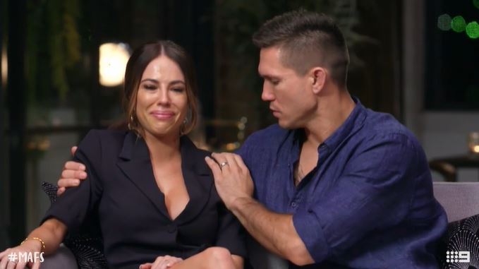 kc and drew, sitting on a couch during a commitment ceremony mafsau season 7